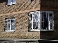 Кованые решетки на окна 13
